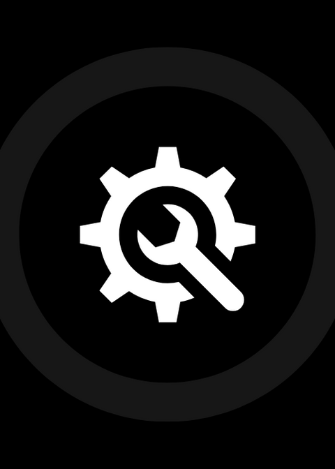 A cartoon drawing of a gear and a wrench