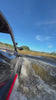 UTV driving through a water hole