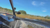 UTV driving through a water hole